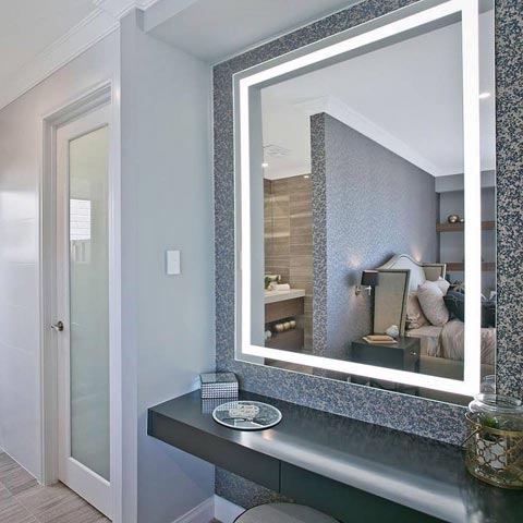 Custom Verge Lighted Mirror at a Make-up desk in the Bedroom